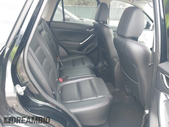 2016 Mazda CX-5 Grand Touring with VIN JM3KE2DY0G0651300, listed as a IAAI auction lot 41678833 with 98,790 mi miles. Bid and sale history available at carsss.com. Image 8.