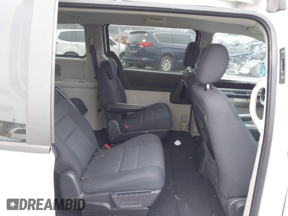 2010 Dodge Grand Caravan SXT with VIN 2D4RN5D1XAR191011, listed as a IAAI auction lot 41162015 with 83,251 mi miles and . Bid and sale history available at DreamBid. Image 8.