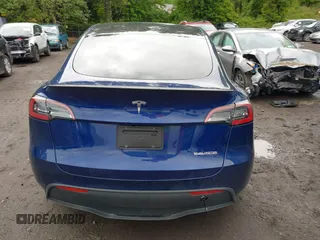 2024 Tesla Model Y Performance z VIN 7SAYGDEF1RA265382, wystawiony jako IAAI lot #42308468 z przebiegiem 9 700 mil mil oraz . Historia ofert i sprzedaży dostępna na DreamBid. Obrazek 16.