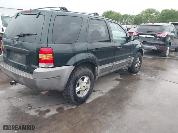 2001 Ford Escape XLT with VIN 1FMCU03101KC25039, listed as a IAAI auction lot 41900122 with 218,126 mi miles. Bid and sale history available at carsss.com. Image 4.