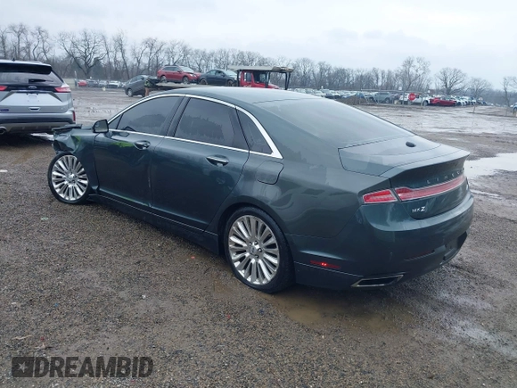 2015 Lincoln MKZ z VIN 3LN6L2J90FR616800, wystawiony jako IAAI lot #41683401 z przebiegiem 92 239 mil mil oraz . Historia ofert i sprzedaży dostępna na DreamBid. Obrazek 3.