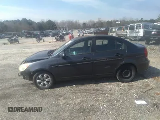2006 Hyundai Accent GLS z VIN KMHCN46C66U027692, wystawiony jako IAAI lot #41796140 z przebiegiem 233 488 mil mil oraz . Historia ofert i sprzedaży dostępna na DreamBid. Obrazek 14.