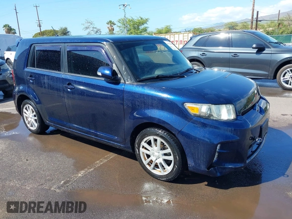 2014 Scion xB with VIN JTLZE4FE6EJ057604, listed as a IAAI auction lot 41528031 with 48,403 mi miles. Bid and sale history available at carsss.com. Image 1.