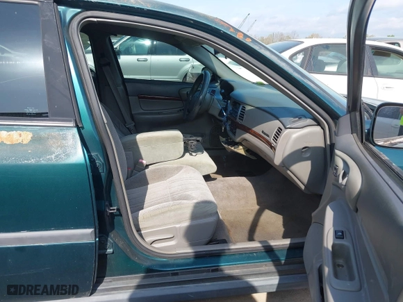 2000 Chevrolet Impala with VIN 2G1WF52E9Y9330910, listed as a IAAI auction lot 41940930 with 232,467 mi miles. Bid and sale history available at carsss.com. Image 5.
