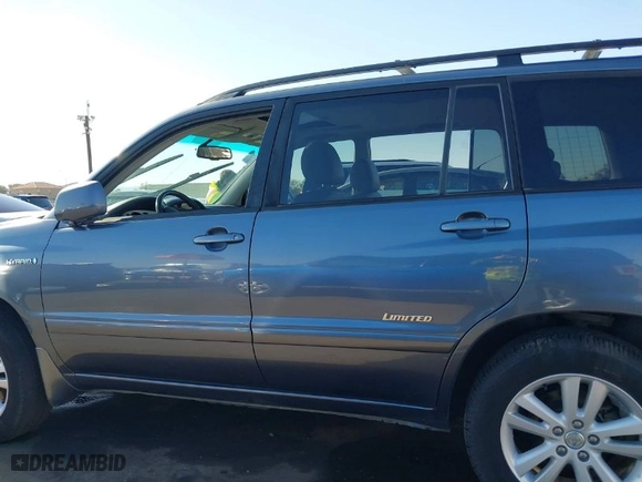 2007 Toyota Highlander Hybrid w/3rd Row with VIN JTEDW21A070023240, listed as a IAAI auction lot 41371725 with 101,457 mi miles. Bid and sale history available at carsss.com. Image 14.