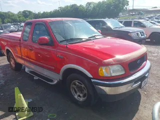 1997 Ford F-150 with VIN 2FTDX1767VCA70642, listed as a IAAI auction lot 42547632 with 217,337 mi miles and . Bid and sale history available at DreamBid. Image 1.