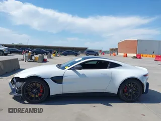 2019 Aston Martin Vantage z VIN SCFSMGAW4KGN01848, wystawiony jako IAAI lot #42032076 z przebiegiem 54 469 mil mil oraz . Historia ofert i sprzedaży dostępna na DreamBid. Obrazek 15.