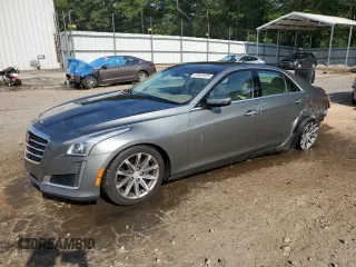 2016 Cadillac CTS Luxury Collection RWD with VIN 1G6AR5SX4G0111665, listed as a Copart auction lot 57645495 with 125,360 mi miles and Salvage title. Bid and sale history available at DreamBid. Image 1.