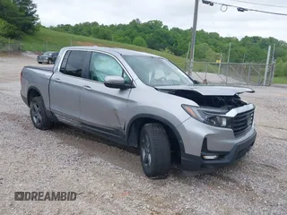 2022 Honda Ridgeline RTL z VIN 5FPYK3F5XNB003389, wystawiony jako IAAI lot #42180799 z przebiegiem Nie podano mil oraz . Historia ofert i sprzedaży dostępna na DreamBid. Obrazek 1.