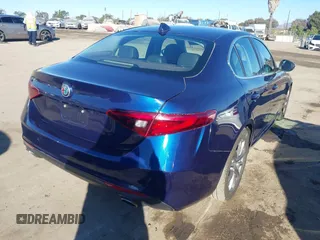 2018 Alfa Romeo Giulia with VIN ZARFAEBN1J7592164, listed as a IAAI auction lot 41411043 with 26,943 mi miles. Bid and sale history available at carsss.com. Image 4.