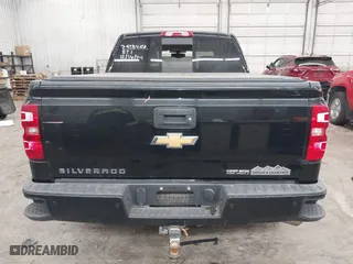 2015 Chevrolet Silverado 1500 High Country with VIN 3GCUKTEJXFG290752, listed as a IAAI auction lot 41412988 with 160,000 mi miles. Bid and sale history available at carsss.com. Image 17.