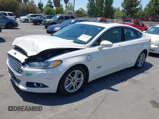 2016 Ford Fusion Titanium z VIN 3FA6P0SU1GR116118, wystawiony jako IAAI lot #42685489 z przebiegiem 138 690 mil mil oraz . Historia ofert i sprzedaży dostępna na DreamBid. Obrazek 2.