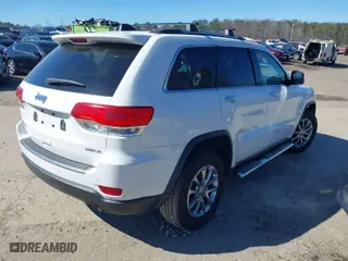 2015 Jeep Grand Cherokee Limited with VIN 1C4RJFBG2FC633317, listed as a IAAI auction lot 41733416 with 169,340 mi miles. Bid and sale history available at carsss.com. Image 4.
