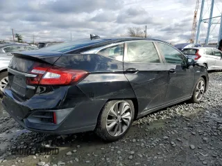 2018 Honda Clarity with VIN JHMZC5F17JC005187, listed as a Copart auction lot 67424942 with 124,862 mi miles. Bid and sale history available at carsss.com. Image 3.