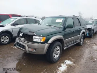 2000 Toyota 4Runner Limited with VIN JT3HN87R6Y0265299, listed as a IAAI auction lot 41569862 with 216,917 mi miles. Bid and sale history available at carsss.com. Image 17.