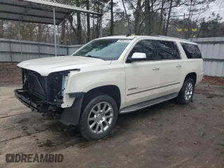 2015 GMC Yukon XL Denali with VIN 1GKS1JKJ4FR161218, listed as a Copart auction lot 86883104 with 184,323 mi miles and Salvage Title. Bid and sale history available at carsss.com. Image 1.