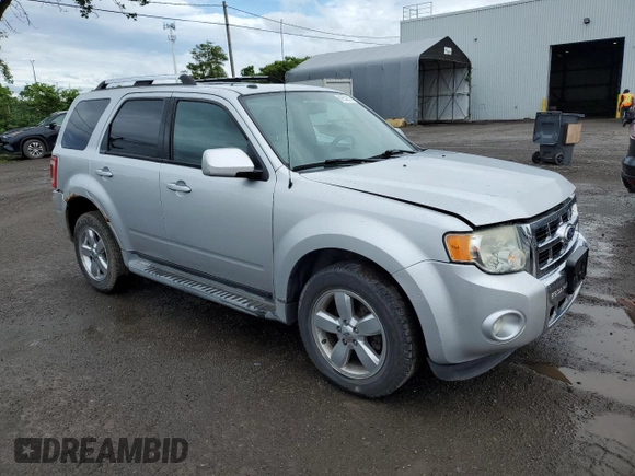 2010 Ford Escape Limited with VIN 1FMCU9EG3AKC97990, listed as a Copart auction lot 61552055 with 278,447 mi miles and Salvage title. Bid and sale history available at DreamBid. Image 4.