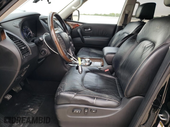 2012 Infiniti QX56 7-passenger with VIN JN8AZ2NE5C9016354, listed as a Copart auction lot 53390775 with 209,990 mi miles and Salvage Title. Bid and sale history available at carsss.com. Image 7.