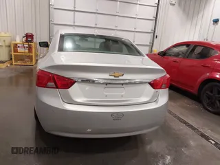2014 Chevrolet Impala LT with VIN 2G1115SL4E9250806, listed as a IAAI auction lot 42119330 with 98,618 mi miles and . Bid and sale history available at DreamBid. Image 16.