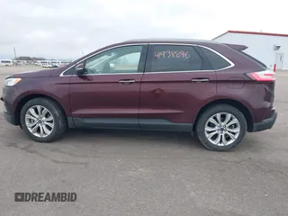2020 Ford Edge Titanium z VIN 2FMPK4K91LBB56297, wystawiony jako IAAI lot #41938896 z przebiegiem 79 875 mil mil oraz . Historia ofert i sprzedaży dostępna na DreamBid. Obrazek 14.