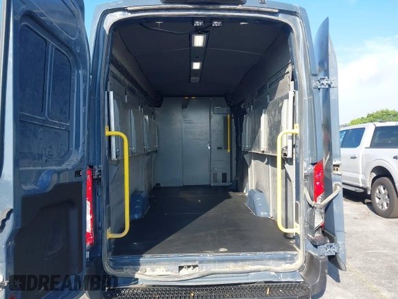2020 Ford Transit Cargo with VIN 1FTBR3X85LKB04164, listed as a IAAI auction lot 41757122 with 101,038 mi miles. Bid and sale history available at carsss.com. Image 8.