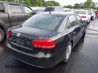 2014 Volkswagen Passat Wolfsburg Edition with VIN 1VWAS7A37EC097863, listed as a IAAI auction lot 42251601 with 106,454 mi miles and . Bid and sale history available at DreamBid. Image 4.