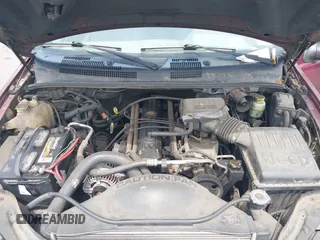 2000 Jeep Grand Cherokee Laredo z VIN 1J4GW48S2YC288439, wystawiony jako IAAI lot #42492798 z przebiegiem 272 527 mil mil oraz . Historia ofert i sprzedaży dostępna na DreamBid. Obrazek 10.