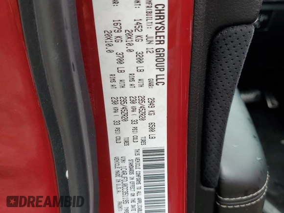 2012 Jeep Grand Cherokee SRT8 with VIN 1C4RJFDJ0CC351195, listed as a Copart auction lot 72794454 with 104,672 mi miles and Salvage Title. Bid and sale history available at carsss.com. Image 13.