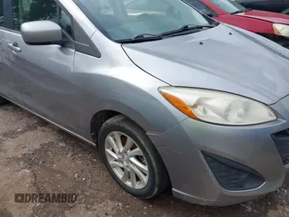 2012 Mazda 5 Sport with VIN JM1CW2BL0C0111151, listed as a IAAI auction lot 42359887 with 158,986 mi miles and . Bid and sale history available at DreamBid. Image 6.
