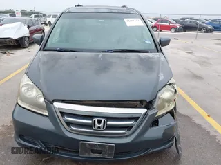 2005 Honda Odyssey EX-L with VIN 5FNRL38775B110232, listed as a IAAI auction lot 42301513 with 277,389 mi miles and . Bid and sale history available at DreamBid. Image 6.