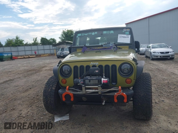 2007 Jeep Wrangler Unlimited X with VIN 1J4GA39177L164566, listed as a IAAI auction lot 42588655 with 50,915 mi miles and . Bid and sale history available at DreamBid. Image 12.