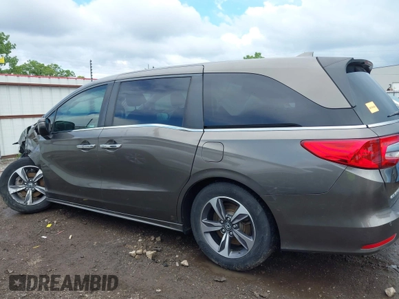 2019 Honda Odyssey Touring with VIN 5FNRL6H81KB038790, listed as a IAAI auction lot 42200190 with 131,761 mi miles and . Bid and sale history available at DreamBid. Image 15.