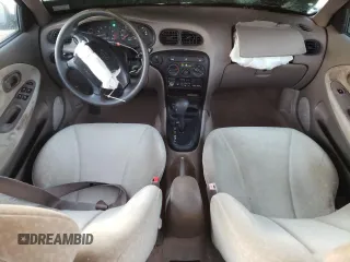 2000 Hyundai Elantra GLS z VIN KMHJF35F6YU890800, wystawiony jako Copart lot #76972294 z przebiegiem 159 134 mil mil oraz Szkoda całkowita • Salvage title. Historia ofert i sprzedaży dostępna na DreamBid. Obrazek 8.