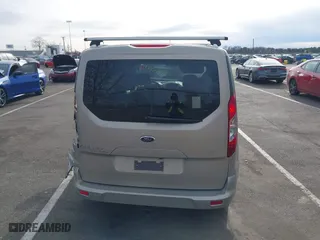 2015 Ford Transit Connect Wagon XLT with VIN NM0AE8F74F1179538, listed as a IAAI auction lot 41505221 with 57,798 mi miles. Bid and sale history available at carsss.com. Image 16.