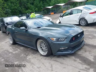 2015 Ford Mustang EcoBoost with VIN 1FA6P8TH6F5347758, listed as a IAAI auction lot 42233319 with 118,130 mi miles and . Bid and sale history available at DreamBid. Image 1.
