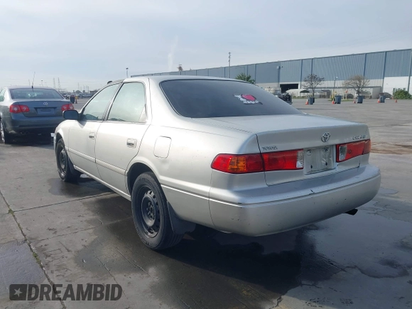 2001 Toyota Camry CE with VIN 4T1BG22KX1U867930, listed as a IAAI auction lot 41764995 with 216,679 mi miles. Bid and sale history available at carsss.com. Image 3.