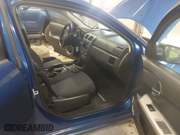 2009 Dodge Avenger SXT with VIN 1B3LC56D19N509995, listed as a IAAI auction lot 42084367 with 161,393 mi miles and . Bid and sale history available at DreamBid. Image 5.