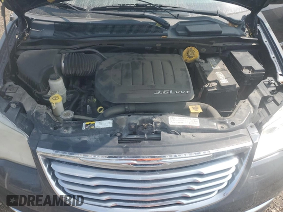2013 Chrysler Town & Country Touring with VIN 2C4RC1BG4DR821029, listed as a Copart auction lot 70609704 with 139,610 mi miles and Salvage Title. Bid and sale history available at carsss.com. Image 12.