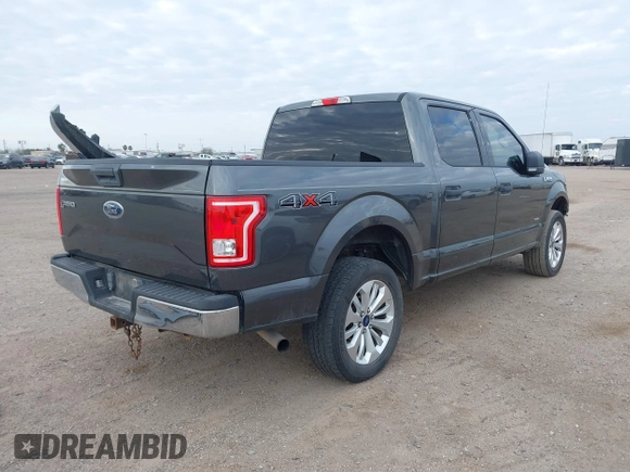 2015 Ford F-150 XLT with VIN 1FTEW1EGXFFA08354, listed as a IAAI auction lot 41627569 with 125,940 mi miles and . Bid and sale history available at DreamBid. Image 4.