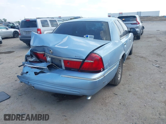 2000 Mercury Grand Marquis LS z VIN 2MEFM75W1YX673105, wystawiony jako IAAI lot #42050980 z przebiegiem 154 944 mil mil oraz . Historia ofert i sprzedaży dostępna na DreamBid. Obrazek 4.