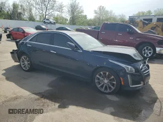 2018 Cadillac CTS Luxury AWD with VIN 1G6AX5SX0J0128430, listed as a Copart auction lot 53480485 with 121,920 mi miles and Salvage title. Bid and sale history available at DreamBid. Image 4.