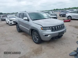 2017 Jeep Grand Cherokee Limited z VIN 1C4RJEBG3HC718941, wystawiony jako IAAI lot #42135965 z przebiegiem 125 074 mil mil oraz . Historia ofert i sprzedaży dostępna na DreamBid. Obrazek 1.