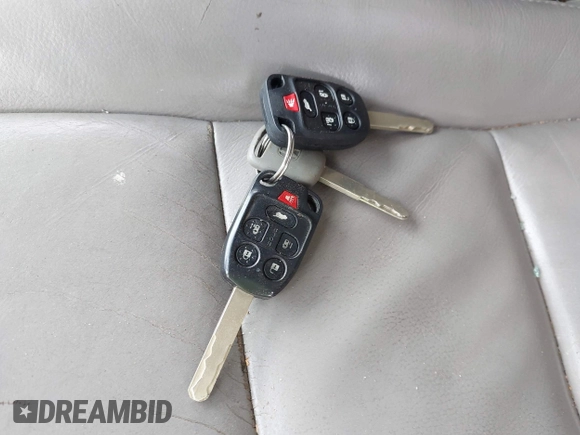 2012 Honda Odyssey Touring с VIN 5FNRL5H90CB083157, выставлен на аукционе IAAI как лот 42176609 с пробегом 250 000 миль миль и . История ставок и продаж доступна на DreamBid. Изображение 11.