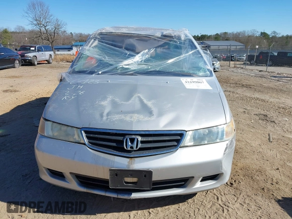 2004 Honda Odyssey EX-L with VIN 5FNRL18924B107971, listed as a IAAI auction lot 41699067 with Not Provided miles and . Bid and sale history available at DreamBid. Image 11.