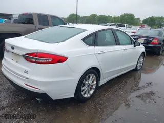 2019 Ford Fusion SE with VIN 3FA6P0HD5KR127641, listed as a IAAI auction lot 41880051 with 61,274 mi miles. Bid and sale history available at carsss.com. Image 4.