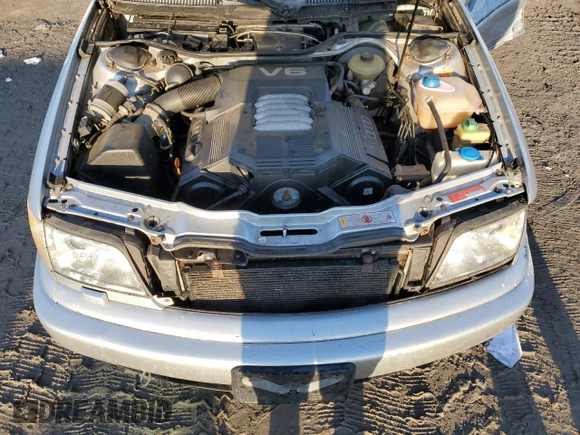 1998 Audi A6 z VIN WAUJC84A0WN001123, wystawiony jako Copart lot #85445164 z przebiegiem Nie podano mil oraz Szkoda całkowita • Salvage title. Historia ofert i sprzedaży dostępna na DreamBid. Obrazek 12.