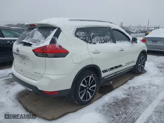 2017 Nissan Rogue SL with VIN 5N1AT2MV9HC792104, listed as a IAAI auction lot 40991192 with 82,393 mi miles. Bid and sale history available at carsss.com. Image 4.