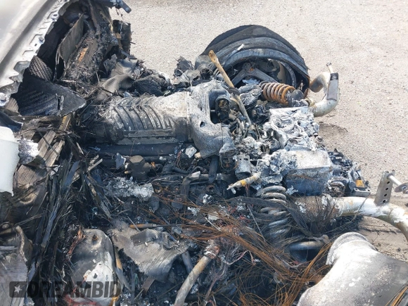 2021 Audi R8 z VIN WUAKBAFX5M7900468, wystawiony jako IAAI lot #41214857 z przebiegiem Nie podano mil oraz . Historia ofert i sprzedaży dostępna na DreamBid. Obrazek 10.