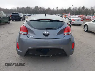 2014 Hyundai Veloster with VIN KMHTC6AD5EU183478, listed as a IAAI auction lot 42107170 with 64,905 mi miles. Bid and sale history available at carsss.com. Image 15.