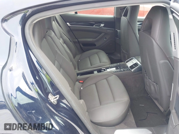 2016 Porsche Panamera 4 z VIN WP0AA2A79GL003724, wystawiony jako IAAI lot #41553849 z przebiegiem 80 551 mil mil oraz . Historia ofert i sprzedaży dostępna na DreamBid. Obrazek 8.